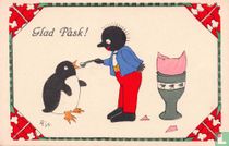 Glad Påsk!: Golliwog voert pinguin hapje ei