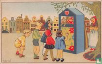 Kinderen kijken naar poppenkast