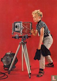 Jongen als fotograaf