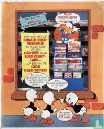Une boîte pleine d'albums et de magazines Disney