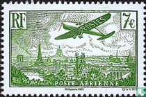 Avion survolant Paris
