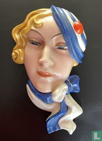 Art Deco ceramic wall mask of a blonde woman