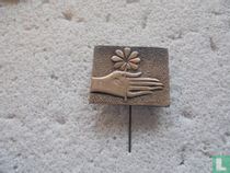 hand  met bloem