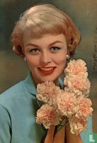 Vrouw lacht - bloemen - Anjers